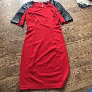 Red cocktail dress with leather sleeve detail